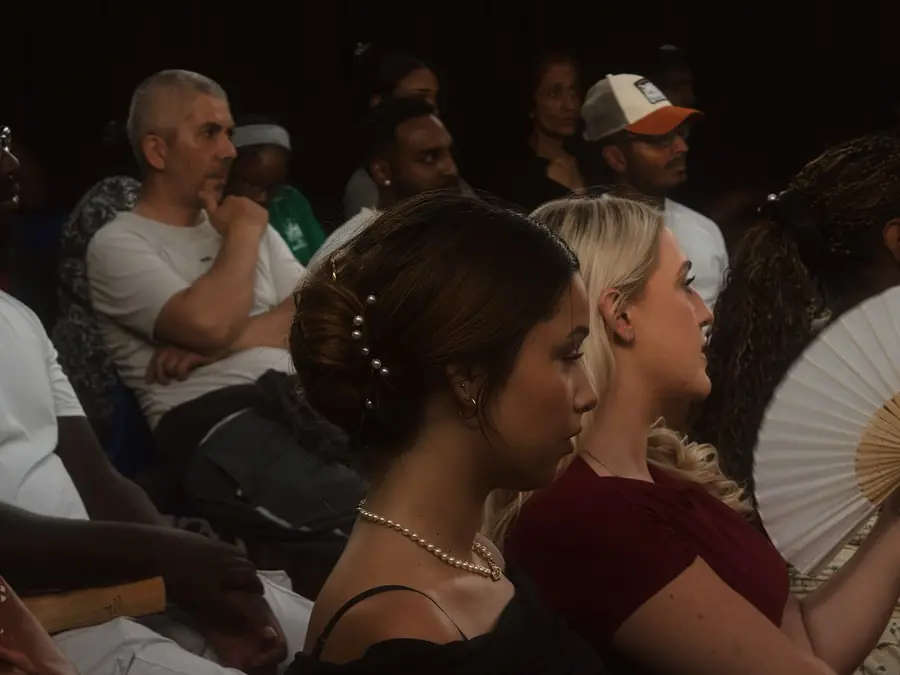 The congregation listening during a service